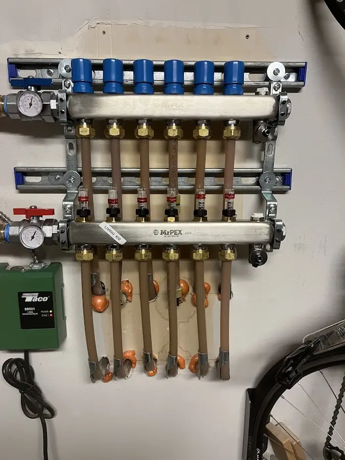 Plumber performing Water Heater Repair at a residential property in Sienna